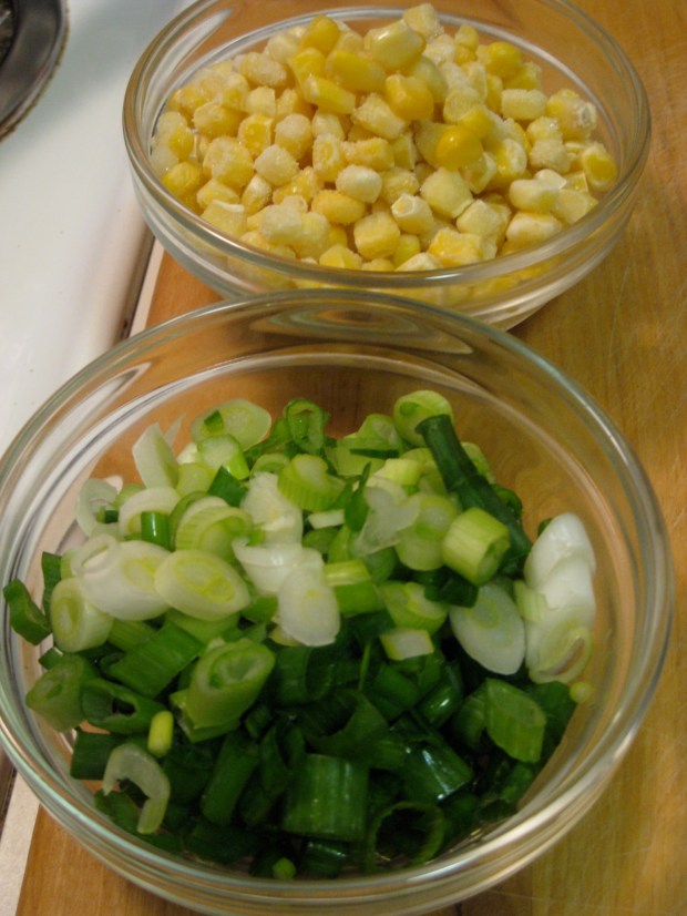 While the beans simmer, prepare your corn and green onions.