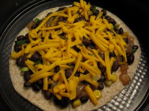 I used small tortillas, and modified the recipe ingredients accordingly. But large works too.