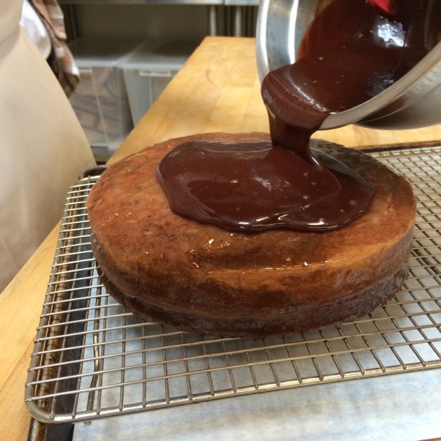 Chocolate glaze on our Sacher Torte Cake.