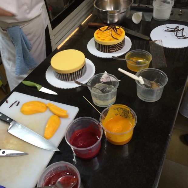 Chef's demonstration of building our first entremet cake.