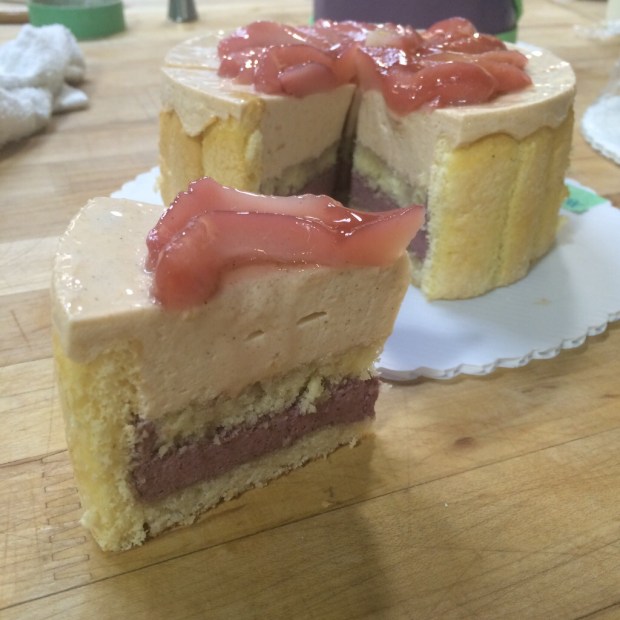 This was my station partner and I's entremet creation: chai blackberry and white peach entremet with poached pear on top and sponge fingers around the outside. It was really good...