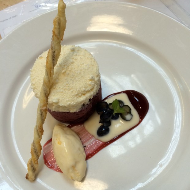 Our dessert! Blueberry and white chocolate mousse, topped with white chocolate powder, a puff pastry stick filled with blueberry frangipane, creme anglaise sauce with fresh blueberry salad, and blueberry rodgrod sauce, with lemon lime sorbet. VOILA.