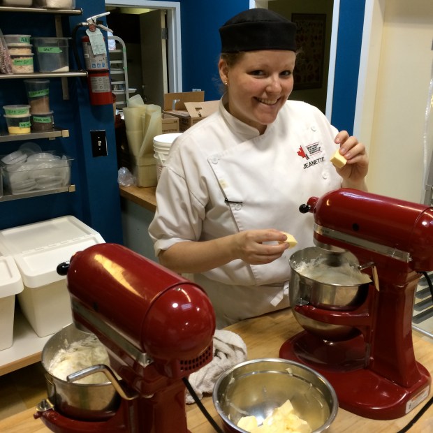 We weren't able to use the larger mixer so I had to make a double batch of lemon italian buttercream in two mixers at the same time. Boiling sugar is poured into the icing, later followed by butterr...