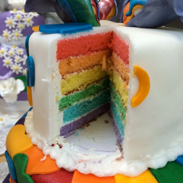 The inside of our cake, all 6-layers of rainbow.